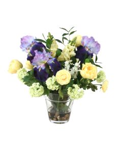 Blue Iris, Ivory Snowballs, Yellow Ranunculuss And Cream Mix of Flowers In Glass Flower Pot Vase