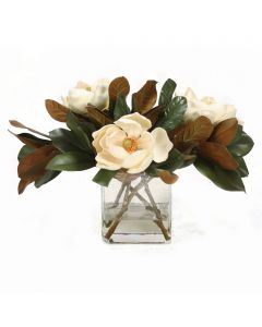 Magnolia Blooms with Magnolia Foliage in Rectangle Glass Vase