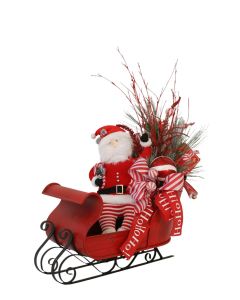 Red Metal Sleigh Decorated With Santa