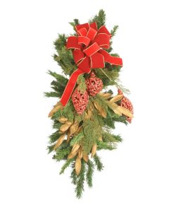 Cedar Swag with Gold Leaves Red Ornaments and A Red Bow with Gold Trim