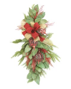 Swag Magnolia Leaves and Cedar Mixed with Red Open Weave Ornaments and Red and Gold Ribbon