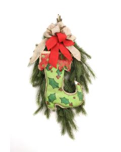 Fir Swag with A Green Holly Print Stocking and A Bow of Red and One of Burlap